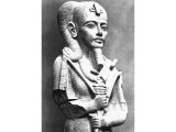 Upper part of a statue of the god Chrons. Granite, 18th Dynasty, c. 1350, from the Temple of Chron, Karnak. In the Cairo Museum.